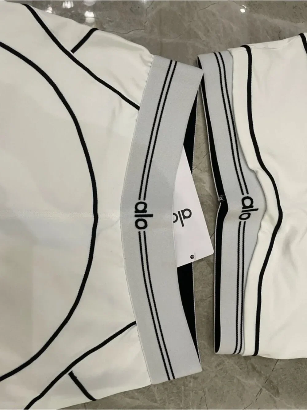 ALO Yoga White High-Waist Leggings with Black Piping